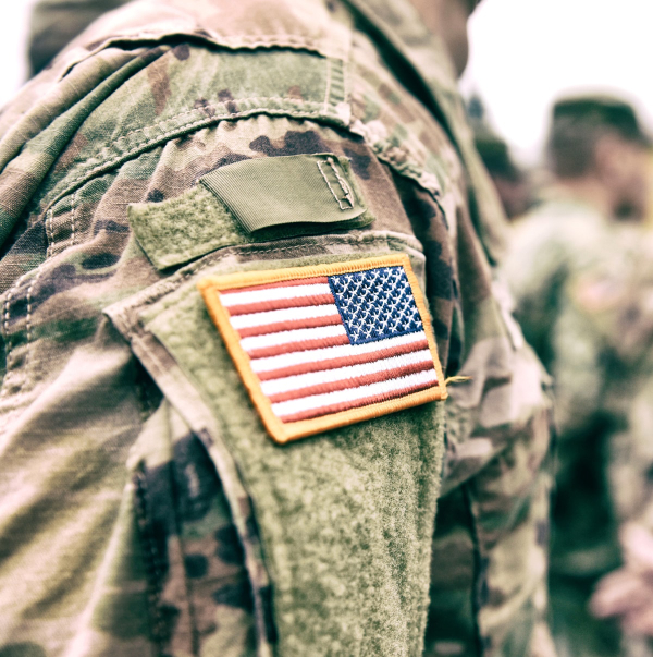 serviceman with flag patch